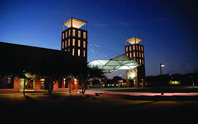 Emerging Technology building at night, located at the West Campus.
